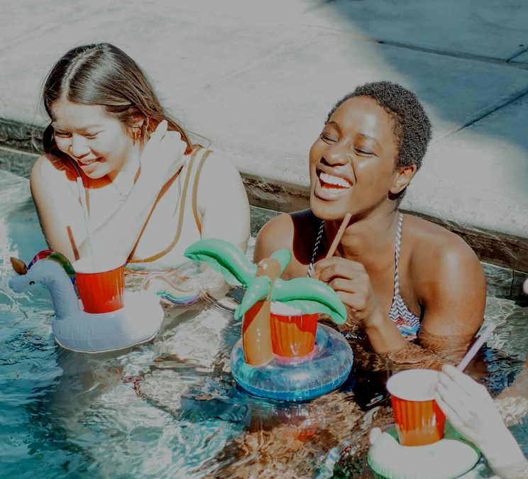 ladies enjoy Nano Boom in pool